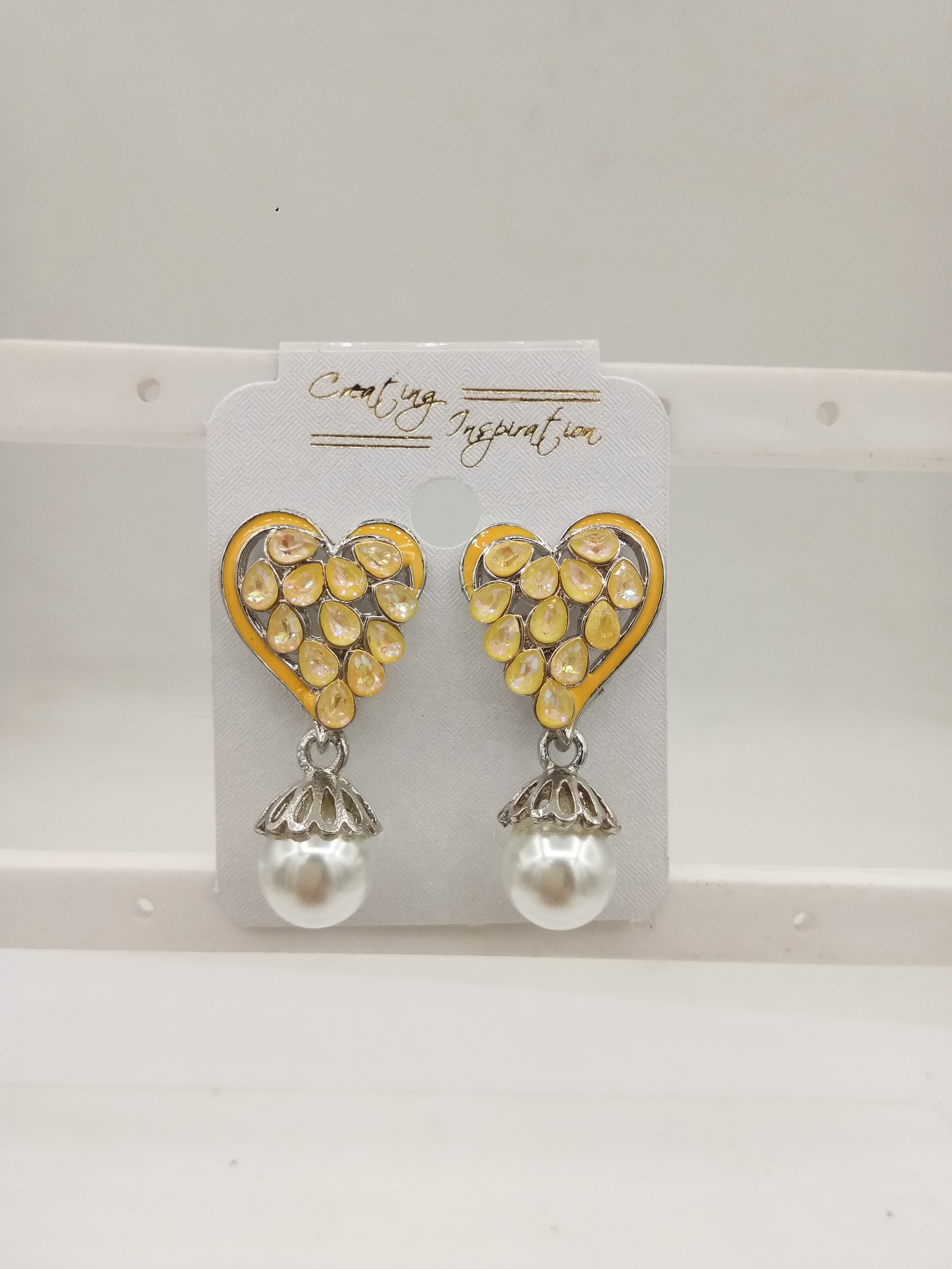 RODIUM CMN + CLR ASSST + WT MOTI TOPS =1111457